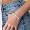 White Pearlised Seed Bead & Pendant Bracelet by Silvery Jewellery